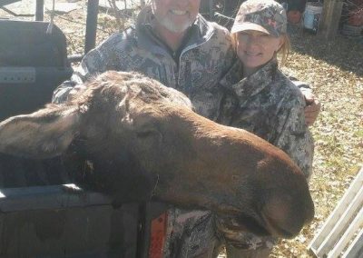 Couple with their moose